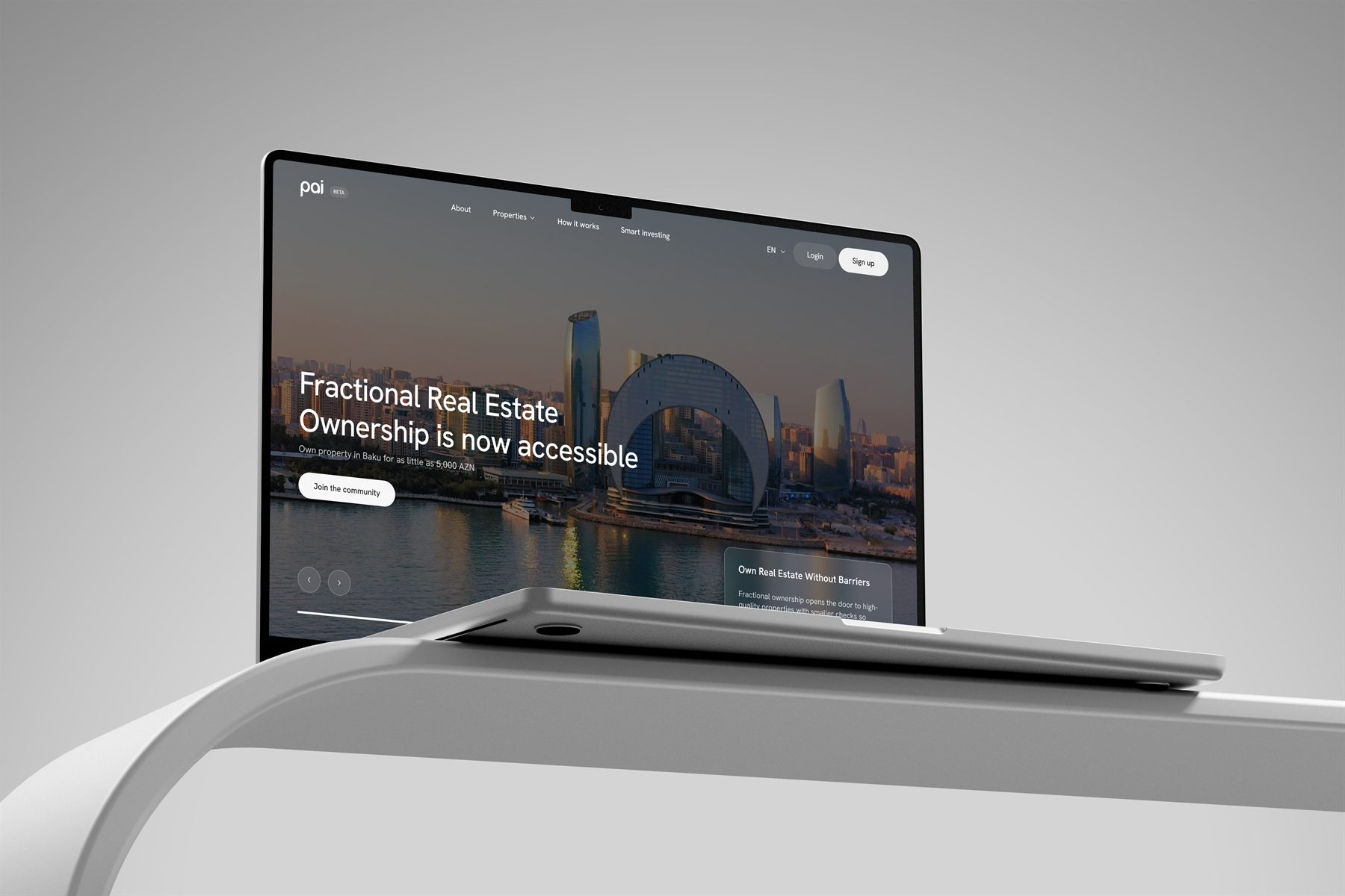 Silver MacBook Pro mockup showing the Pai app landing page on a light background
